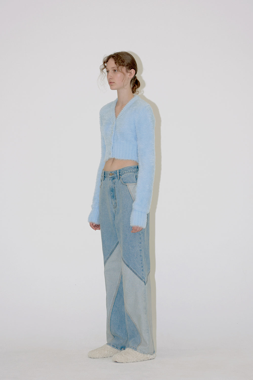 DIAGONAL SECTION DENIM PANTS IN BLUE