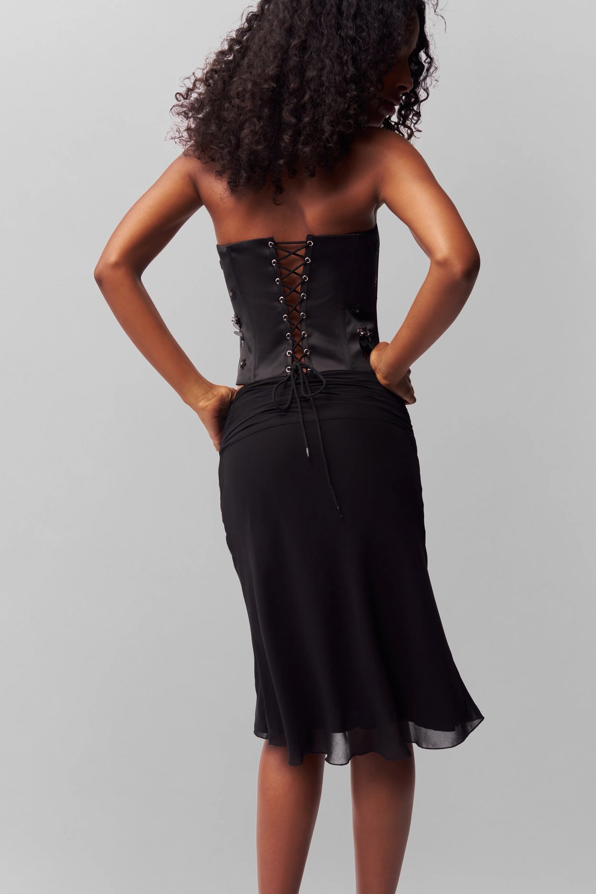EMBELLISHED SATIN CORSET IN BLACK