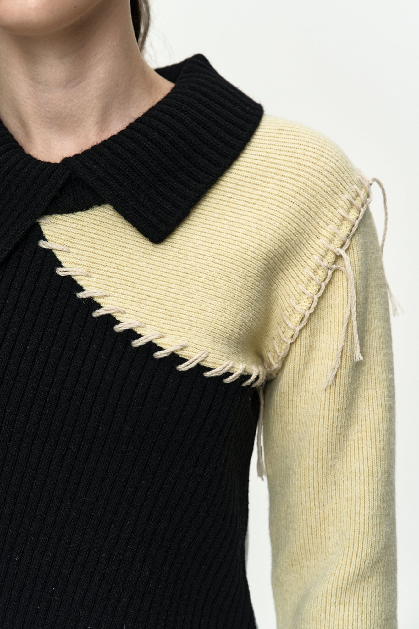 ASYMMETRIC PANEL COLLAR SWEATER