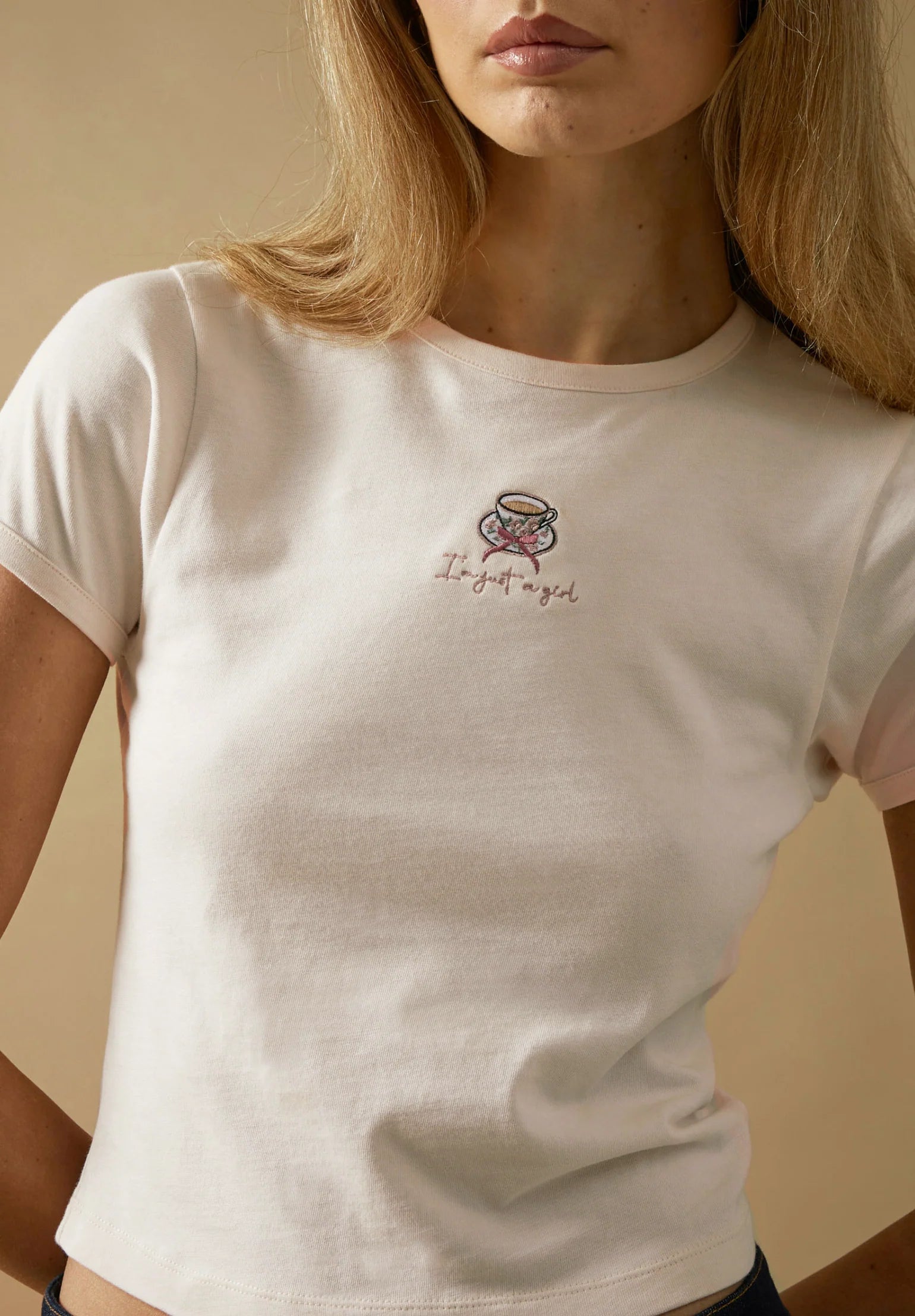 IM JUST A GIRL BABY TEE IN BLUSH